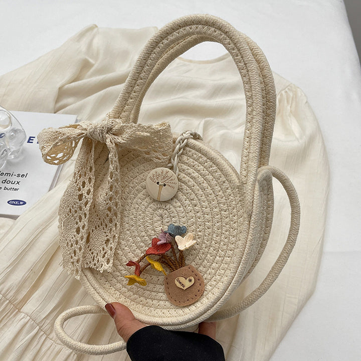 Handcrafted Floral Accent Straw Bag