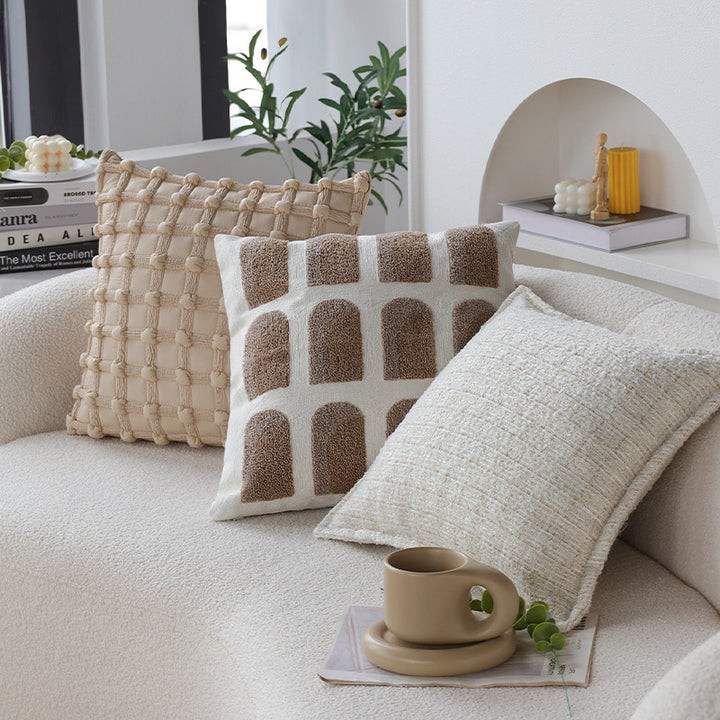 Square cushion cover made of textured bouclé blend with decorative piped seam Kalsten