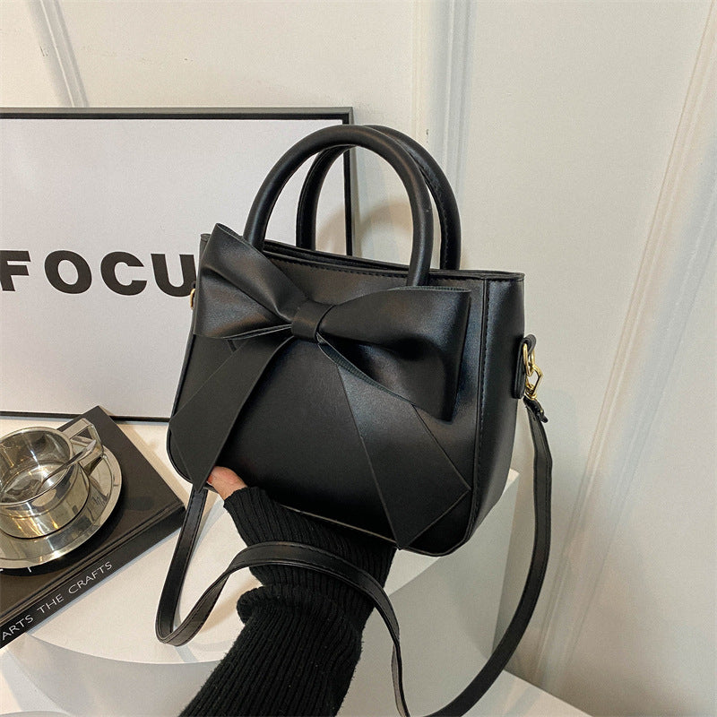 Chic Bow-Accented Handheld Bag