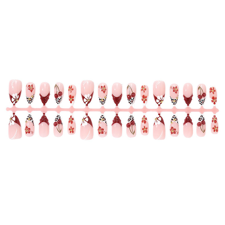 Artificial nail set with floral 3D designs and elegant accents Kalsten