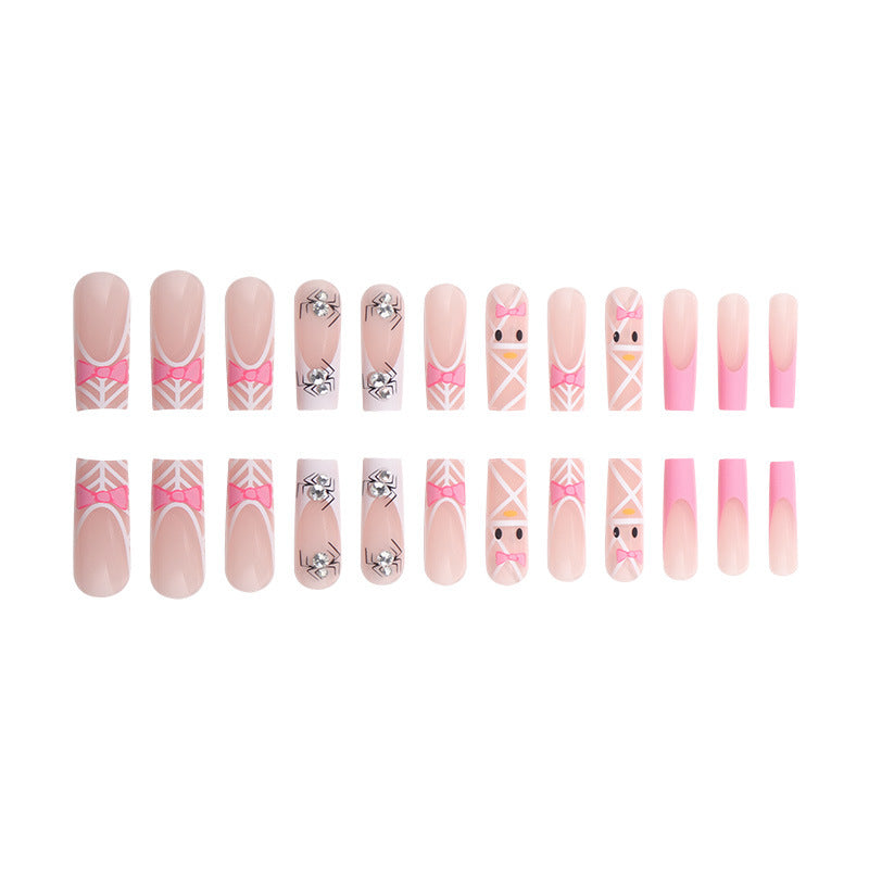 Artistic Press-On Nail Extensions with Spider and Bow Design Kalsten