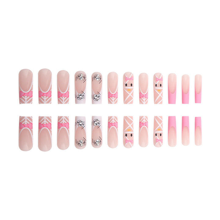 Artistic Press-On Nail Extensions with Spider and Bow Design Kalsten