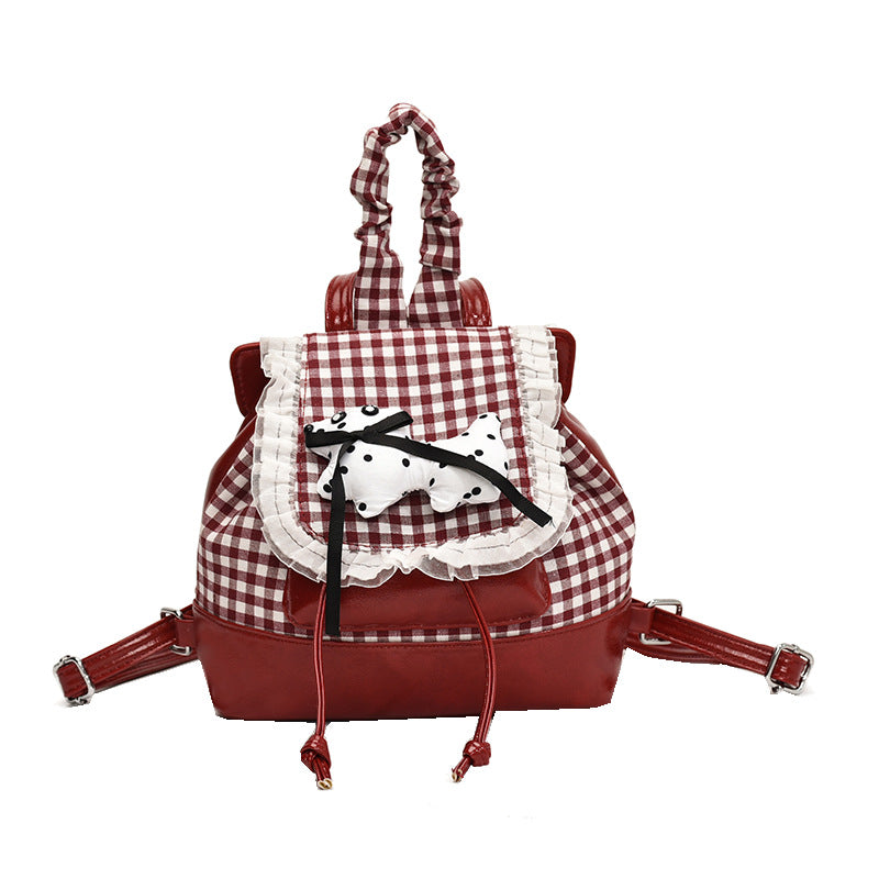 Playful backpack with checkered pattern and animal appliqué Kalsten