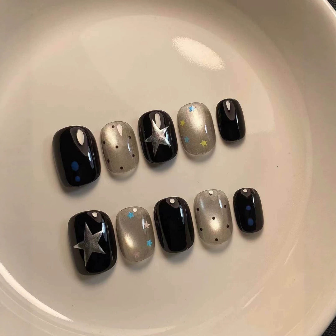 Artistic Press-On Nail Set with Celestial Designs