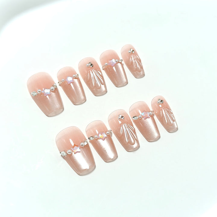 Elegant artificial nails with pearl and rhinestone embellishments Kalsten