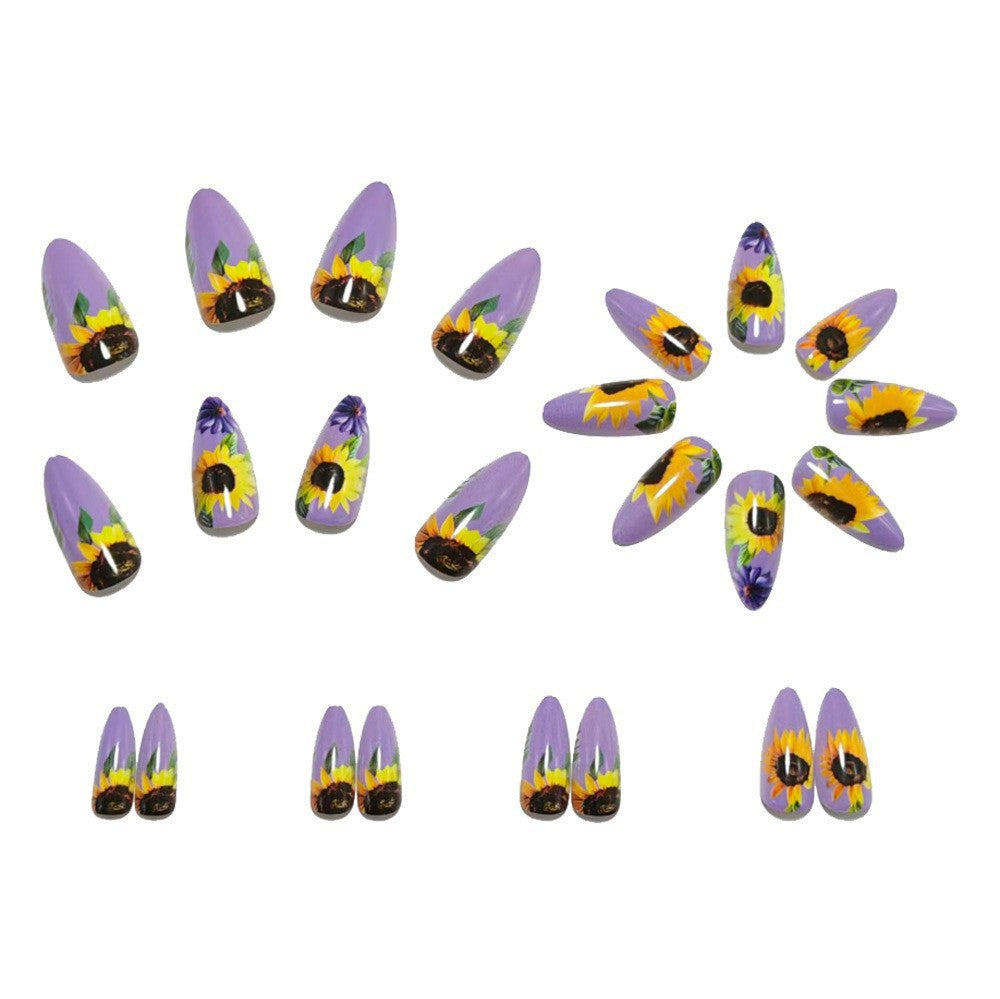 Art nails with elaborate sunflower motifs Kalsten