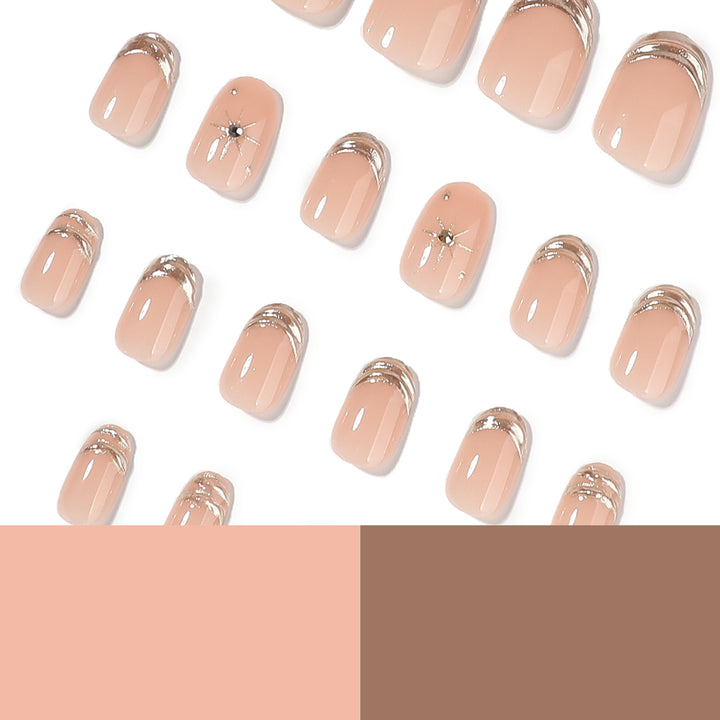 Glamorous nail extensions with elegant metallic accents Kalsten