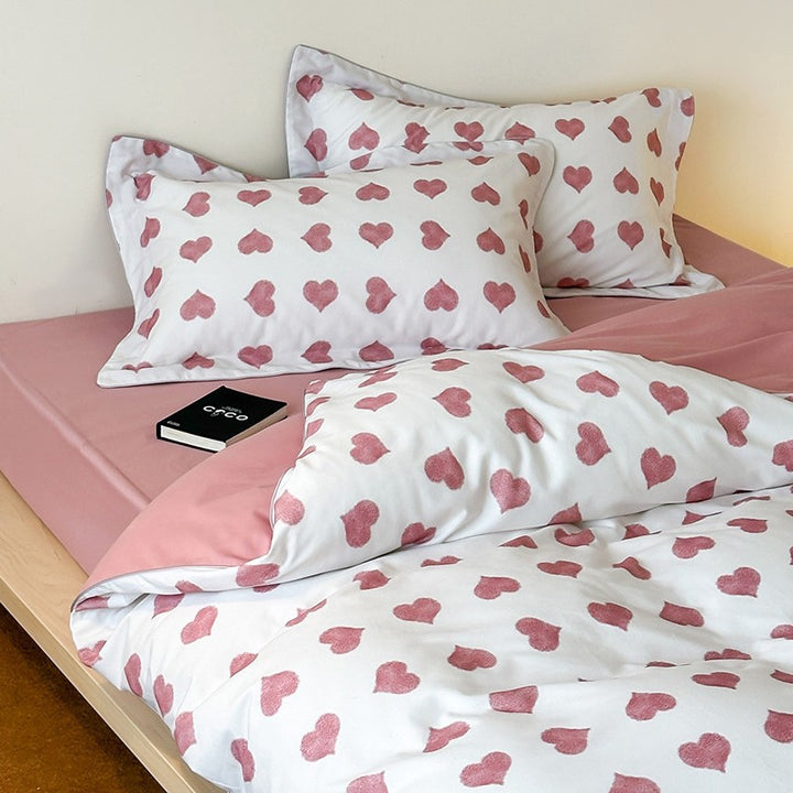 Reversible cotton bedding set with playful sheep print and soft jersey finish