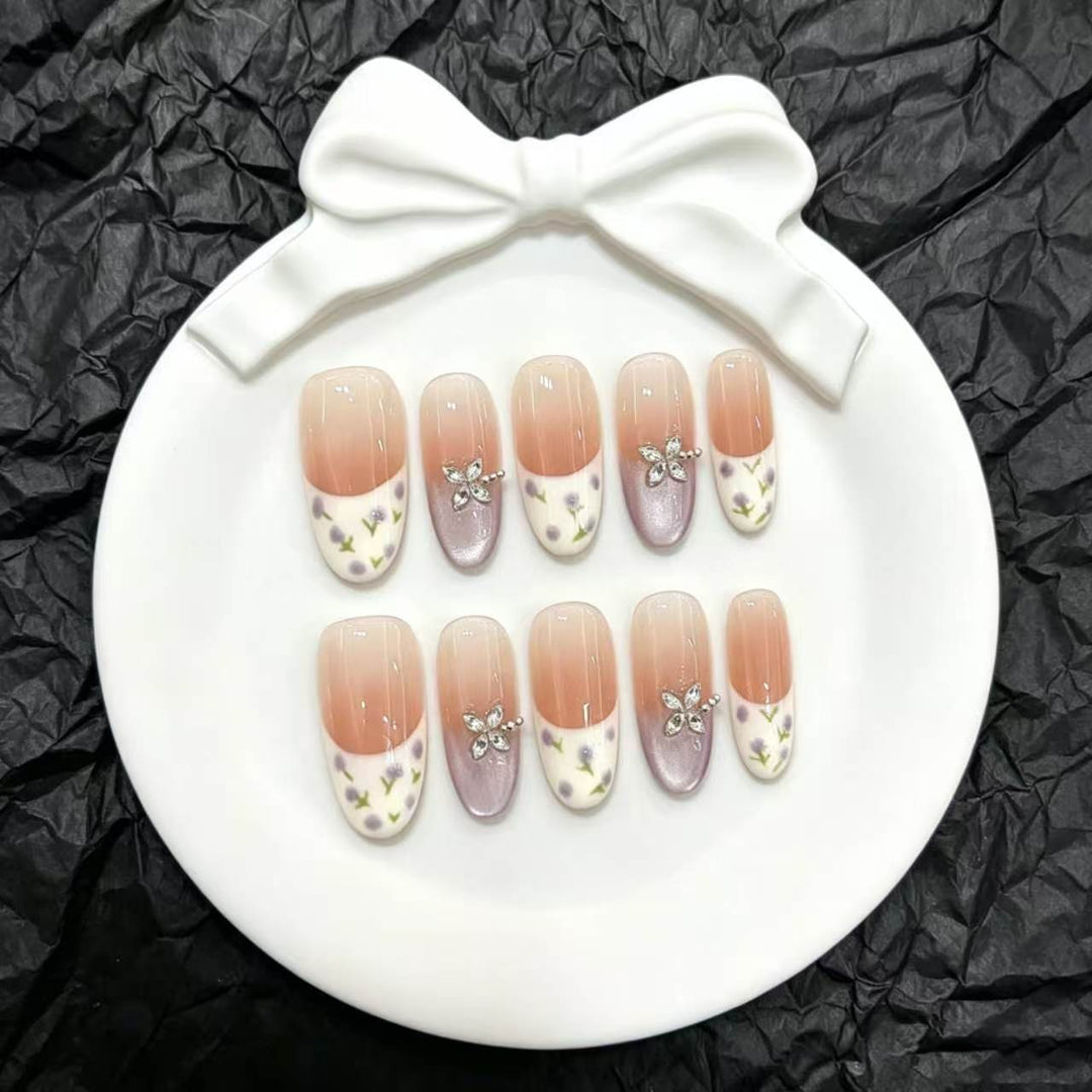 Artistic Press-On Nail Design Set with Floral Embellishments