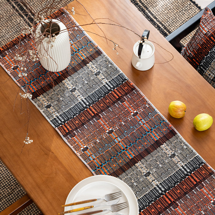 Handwoven table runner made of robust cotton blend with fringes