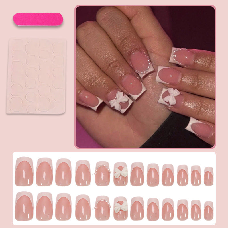 Artifice nail set with elegant flower and pearl decorations Kalsten