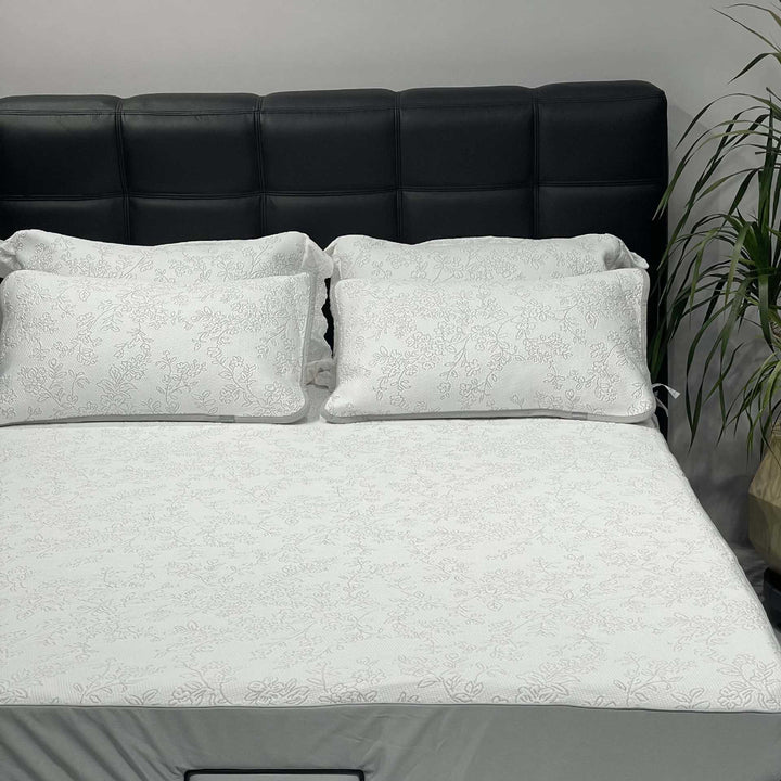 Quilted cotton bedspread set with honeycomb quilting, lace trim, and matching pillow covers