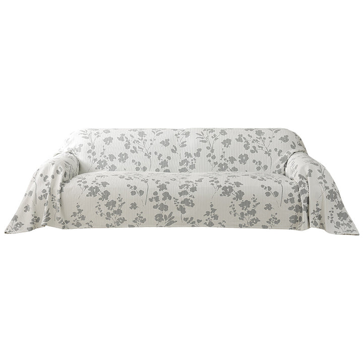 Generous sofa cover for 3-seater with floral jacquard structure