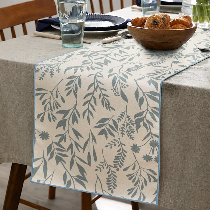 Woven table runner in botanical leaf pattern made of cotton blend Kalsten