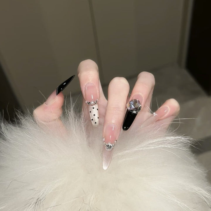 Artificial nails in elegant design with glittering decorations Kalsten