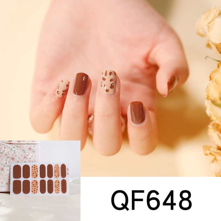 Artificial nail art with heart-shaped designs and soft color gradients Kalsten