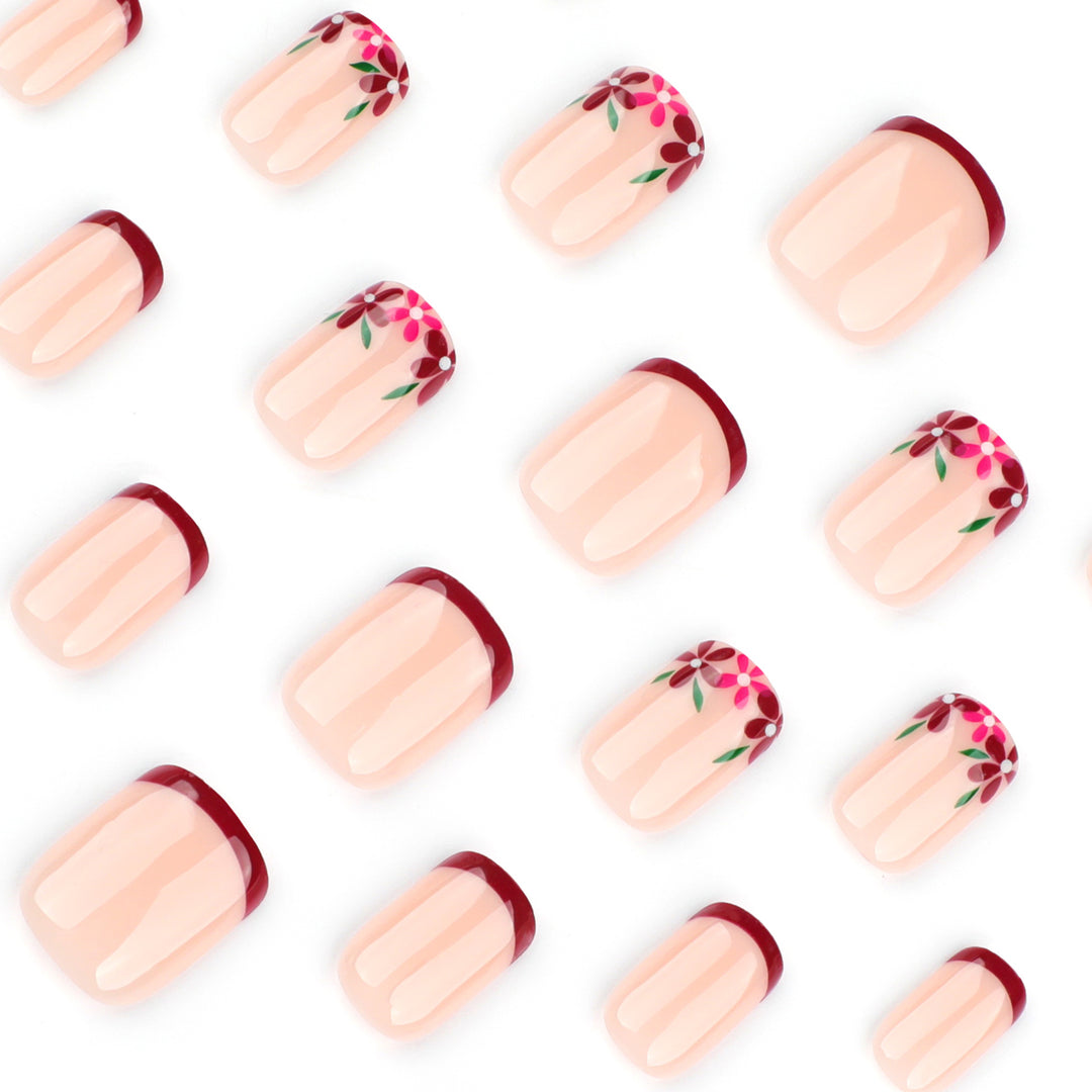 Artful nail design with flower and gradient effects Kalsten