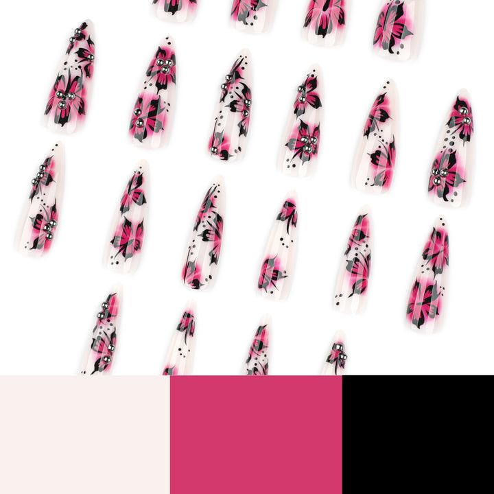 Artful nail art with floral design and rhinestone accents Kalsten