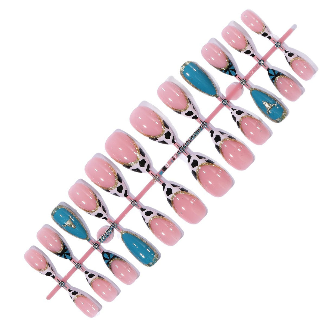Artistic Stiletto Nail Art Extensions with Cow Print and Gold Accents Kalsten