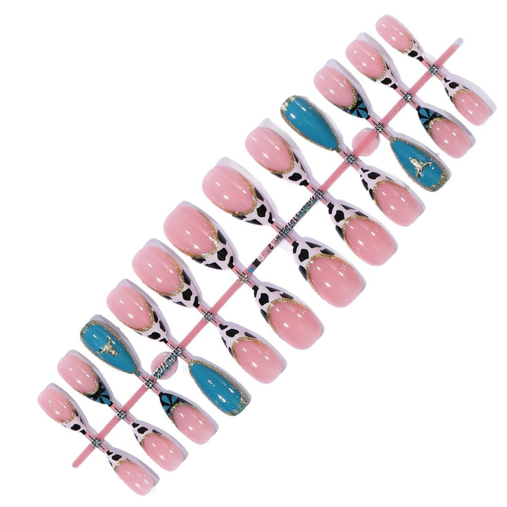 Artistic Stiletto Nail Art Extensions with Cow Print and Gold Accents Kalsten