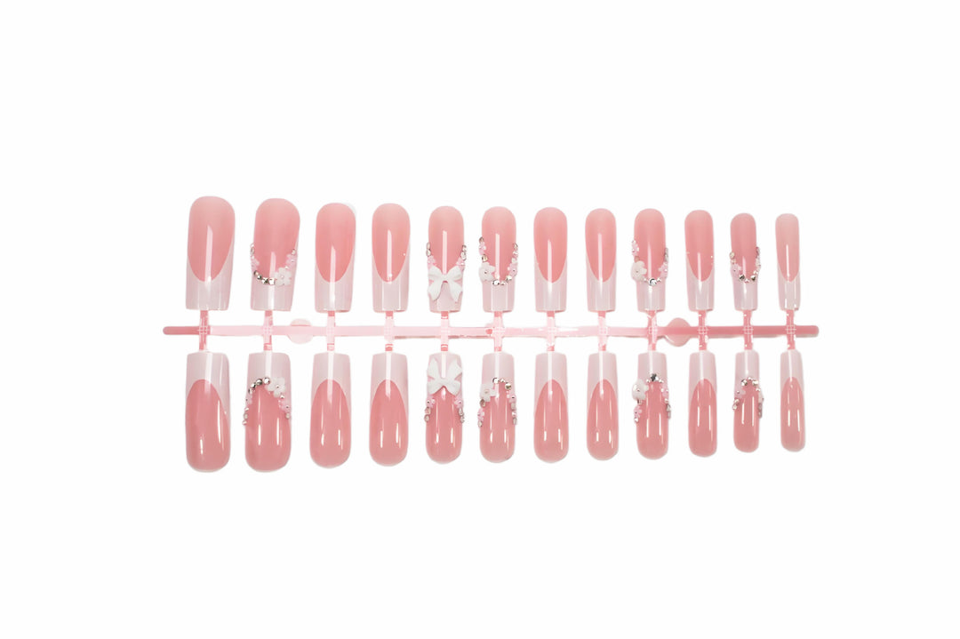 Acrylic Nail Set with Elegant Bows and Glitter Accents Kalsten