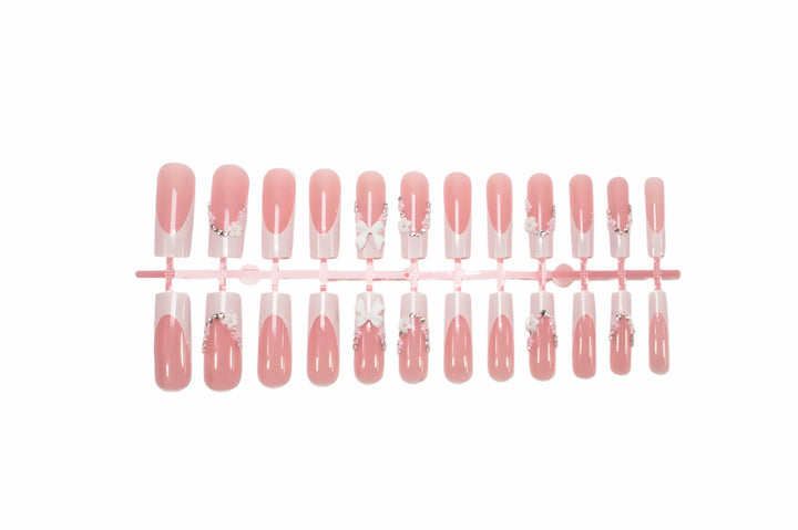 Acrylic Nail Set with Elegant Bows and Glitter Accents Kalsten
