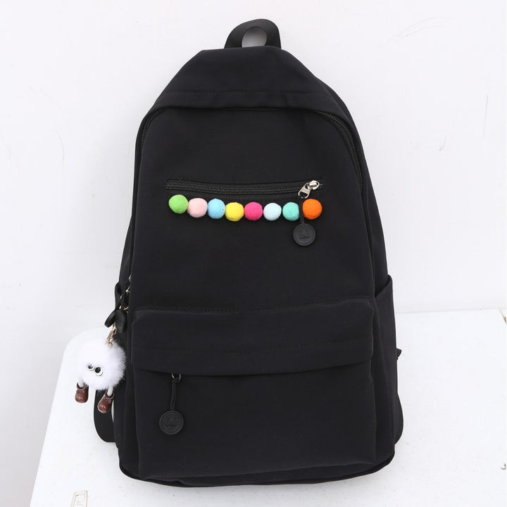 Practical backpack with colorful applications Kalsten