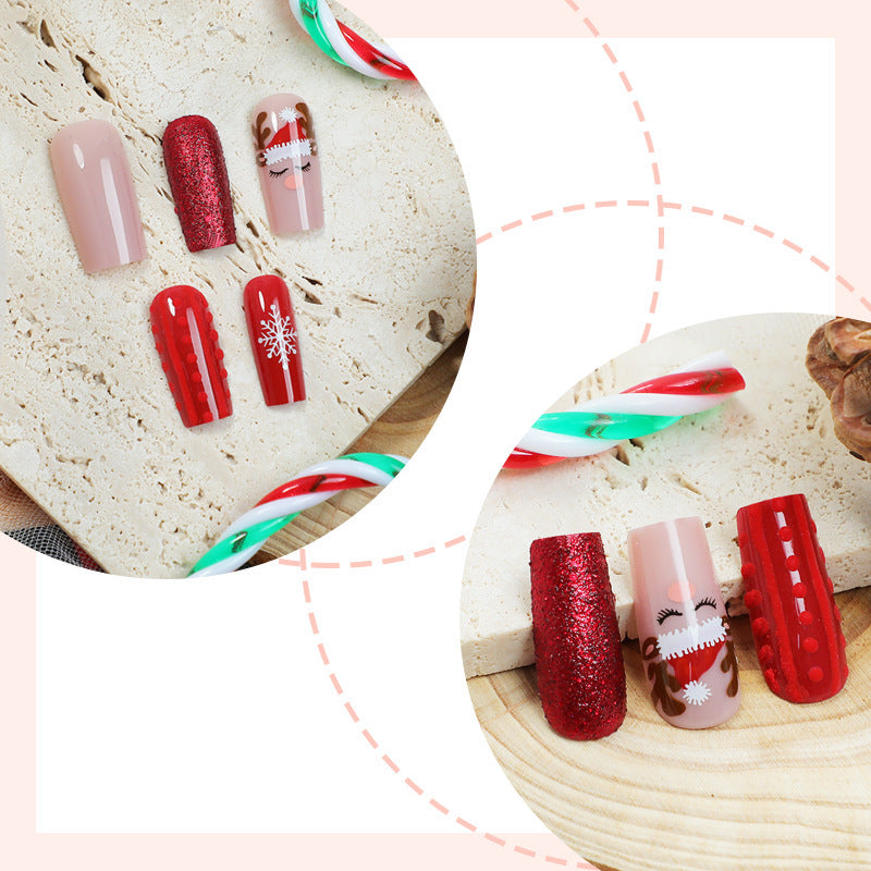 Artificial nail set with festive Christmas designs and glitter accents Kalsten