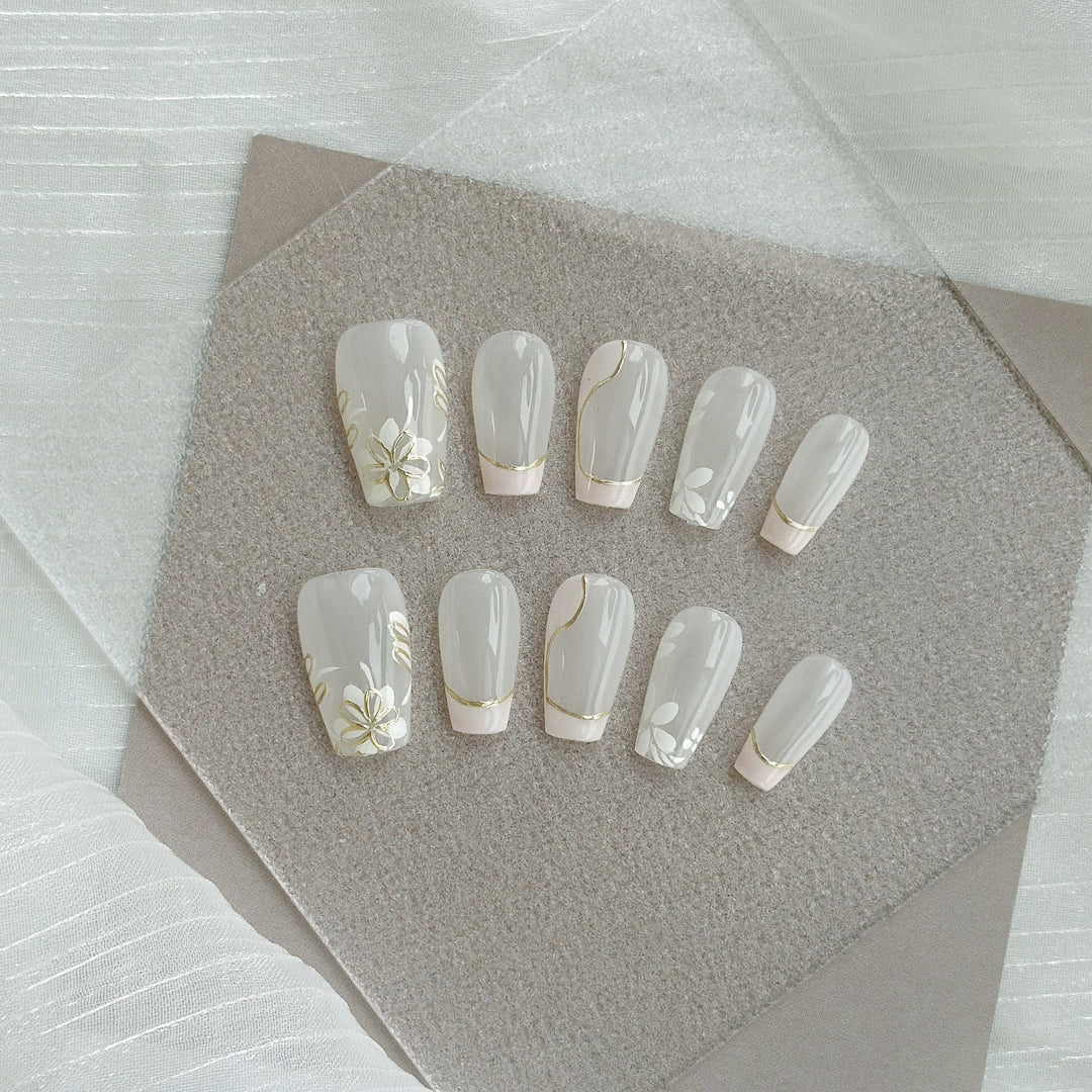 Artistic Press-On Nail Art Set with Heart and Celestial Designs