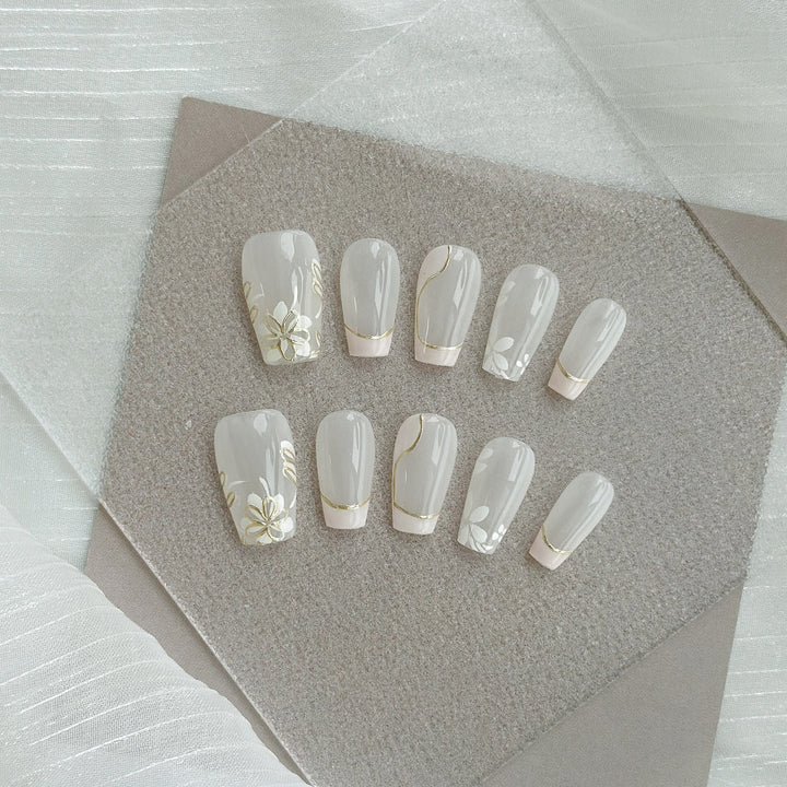 Artistic Press-On Nail Art Set with Heart and Celestial Designs