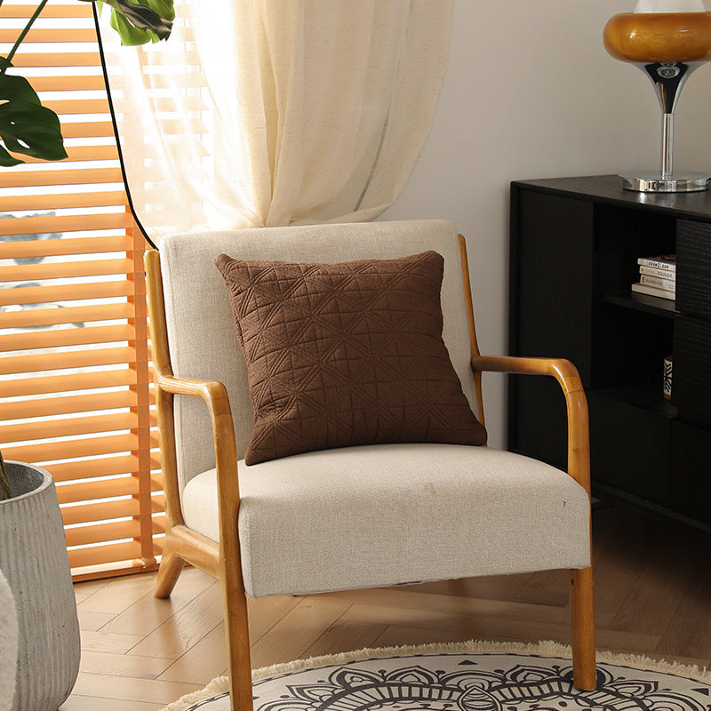 Square quilted decorative cushion made of cotton blend fabric with geometric cross quilted pattern