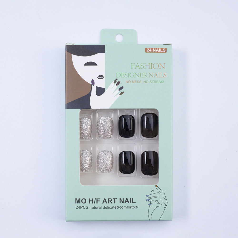 Artificial nails in elegant black with gloss and creative accents Kalsten