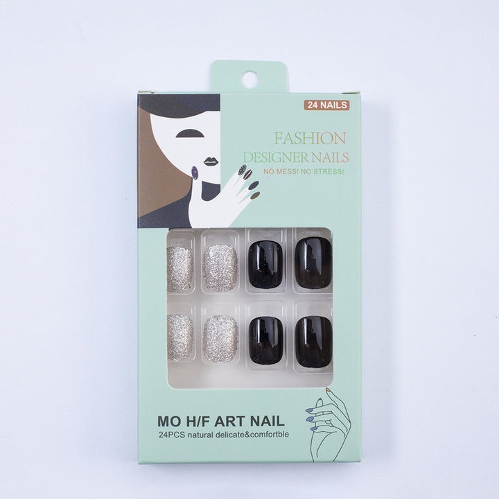 Artificial nails in elegant black with gloss and creative accents Kalsten