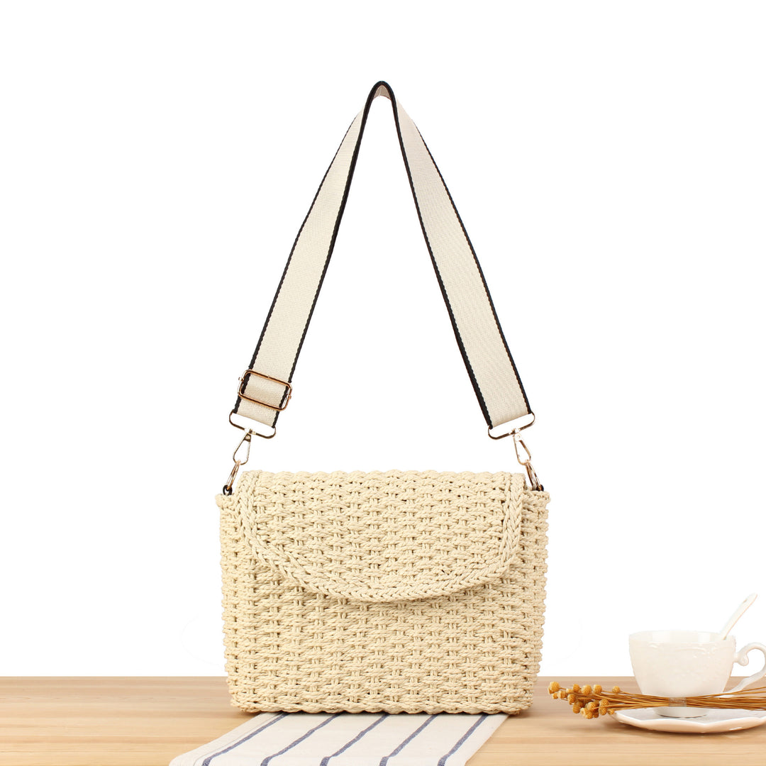 Handbag made of woven natural material with adjustable shoulder strap Kalsten