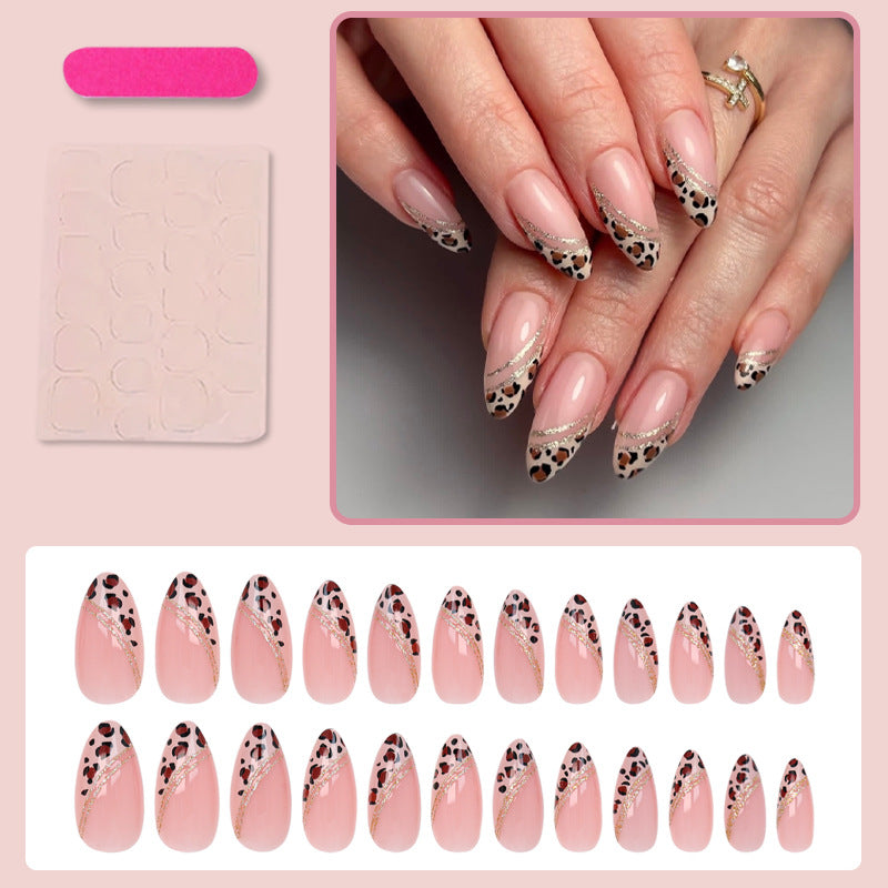 Acrylic nail set with glamorous animal print and elegant accents Kalsten