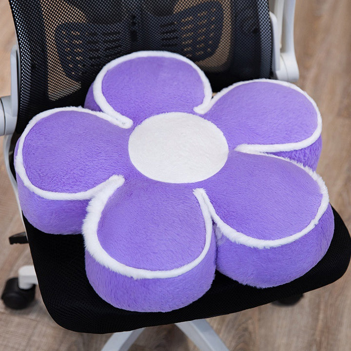 Padded seat cushion in flower shape with faux leather center piece and fluffy edge padding