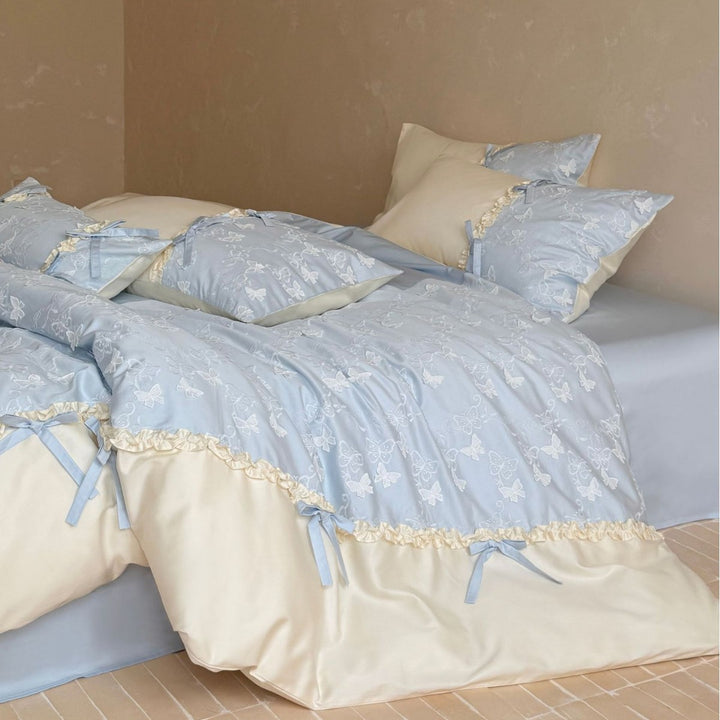 Luxurious bedding set with butterfly embroidery, ruffles and decorative bows