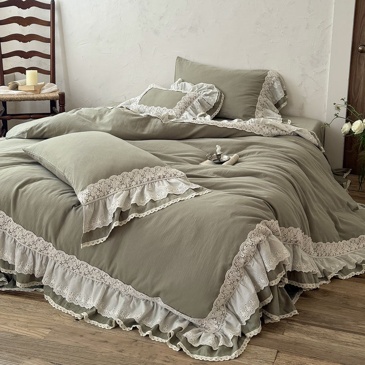 Romantic bedding set in country house style with ruffles and lace trim