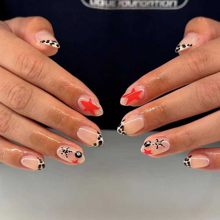 Artificial nail set with playful animal and star designs Kalsten