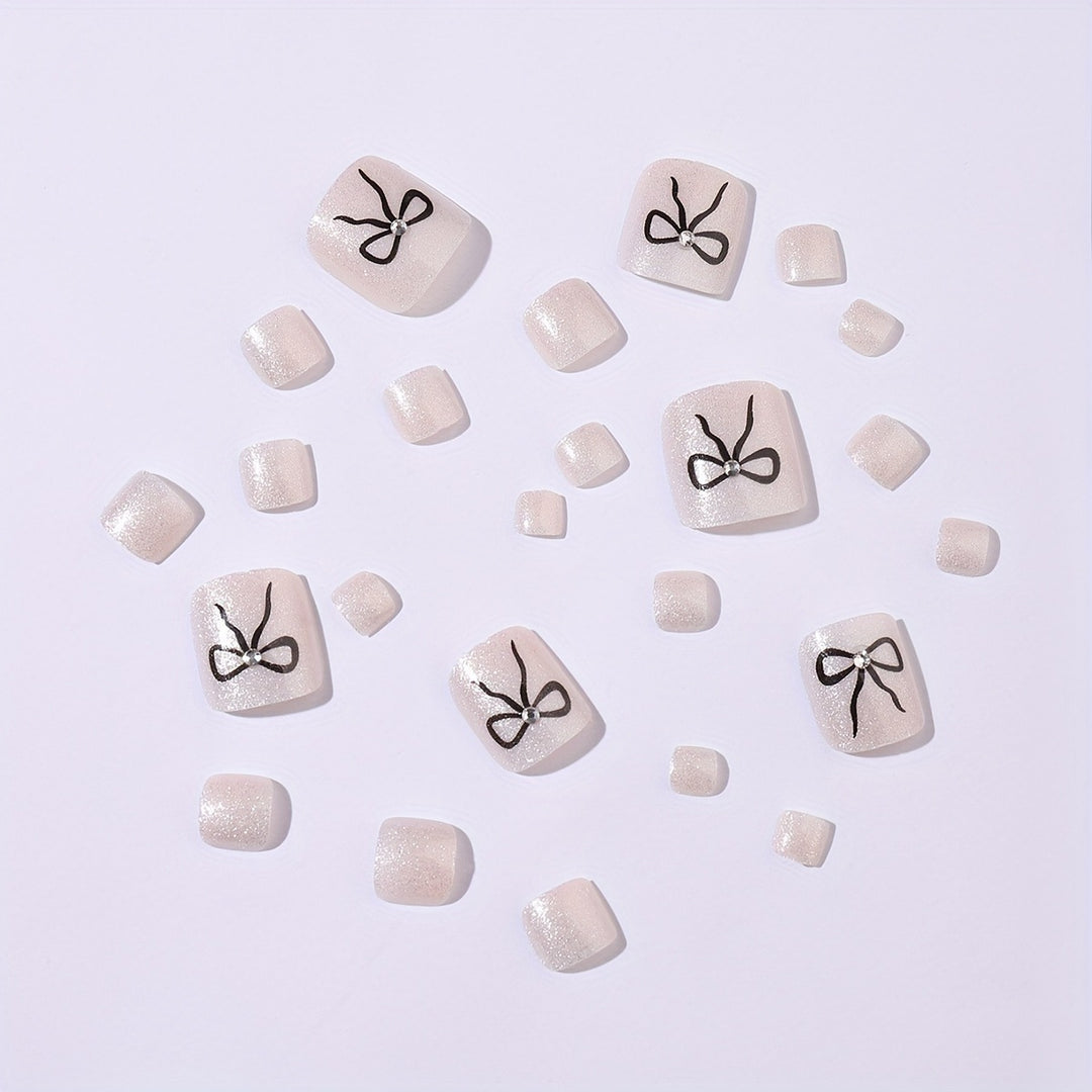 Acrylic nail set with sparkling accents and elegant bows Kalsten