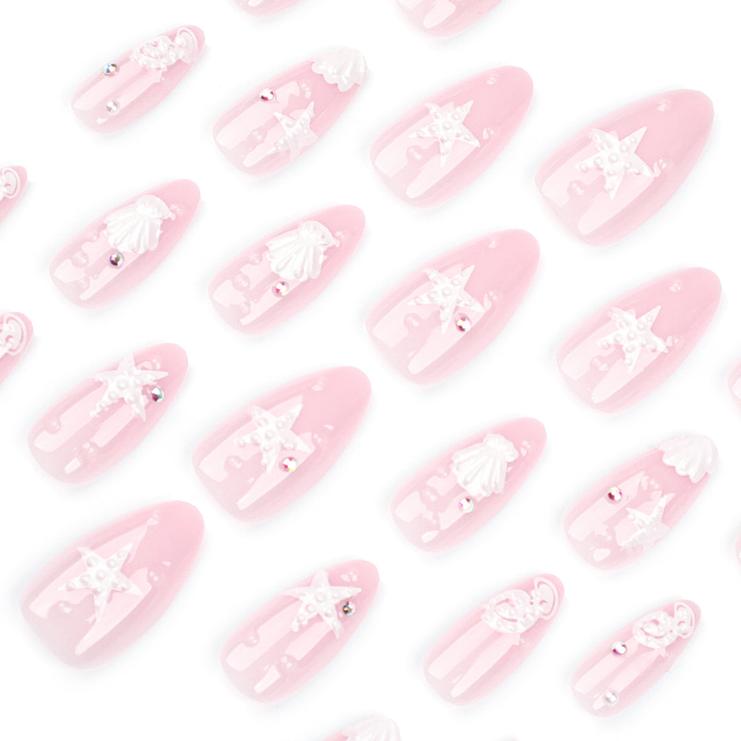 Artistic nail designs with shell and star motif Kalsten