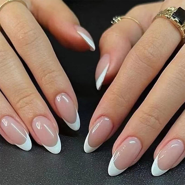 Artful stiletto nails with heart-shaped accents Kalsten