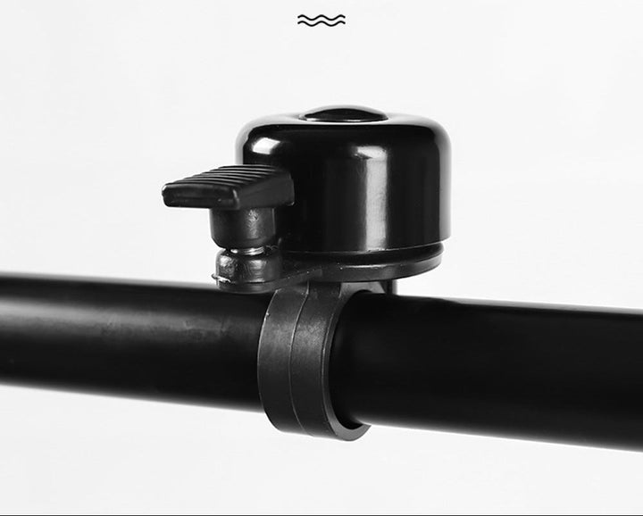 compact universal bicycle handlebar bell with quick-release mount Kalsten