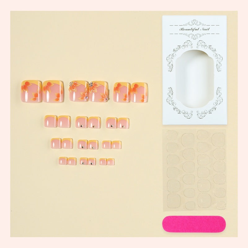 Artificial nail set with floral design and glitter accents Kalsten