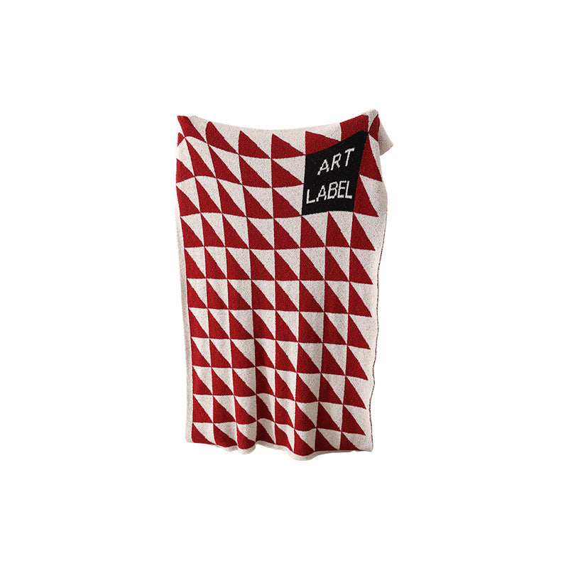 Coarsely woven decorative blanket with geometric jacquard pattern and soft bouclé Kalsten