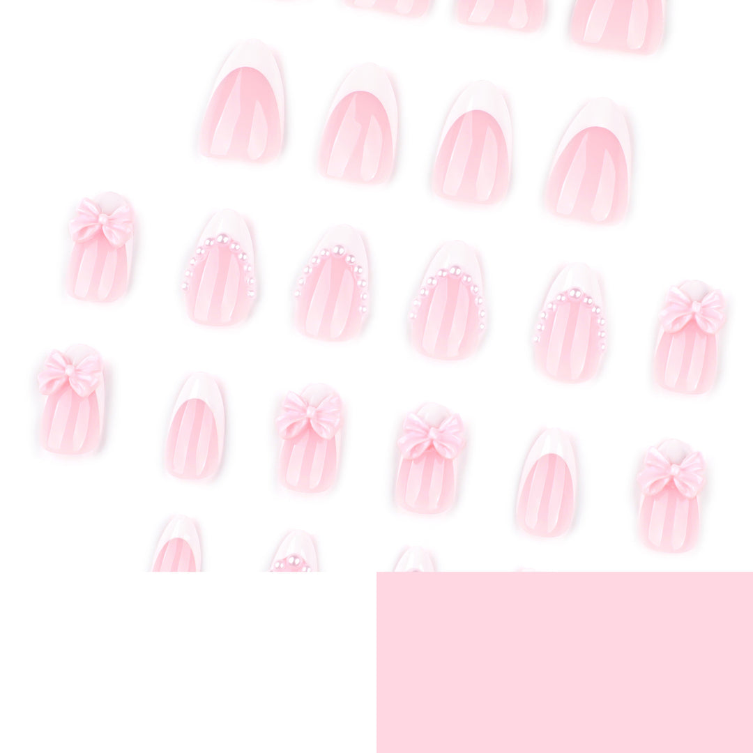 Artful Stiletto Nails with Delicate Bow Accents Kalsten