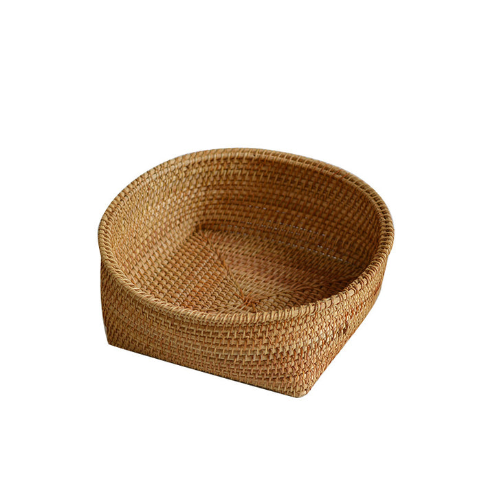 Handcrafted storage basket made of natural rattan Kalsten