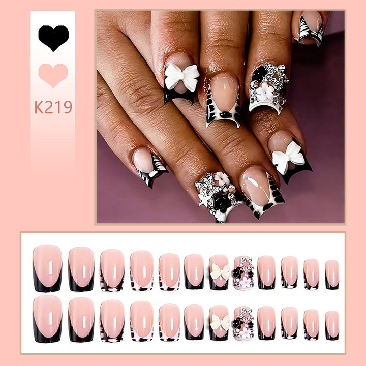 Artificial nail design with elaborate 3D decorations Kalsten