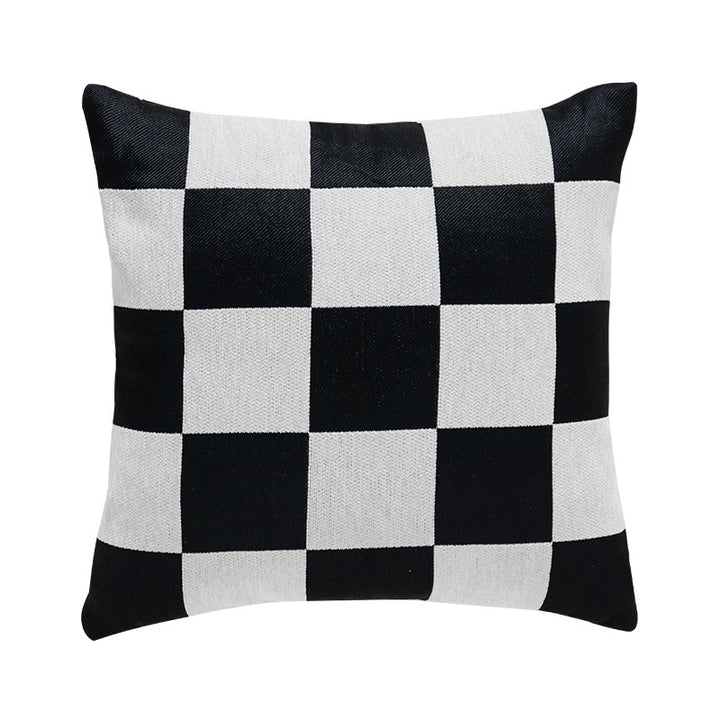 Square decorative cushion with woven checkered pattern and hidden zipper
