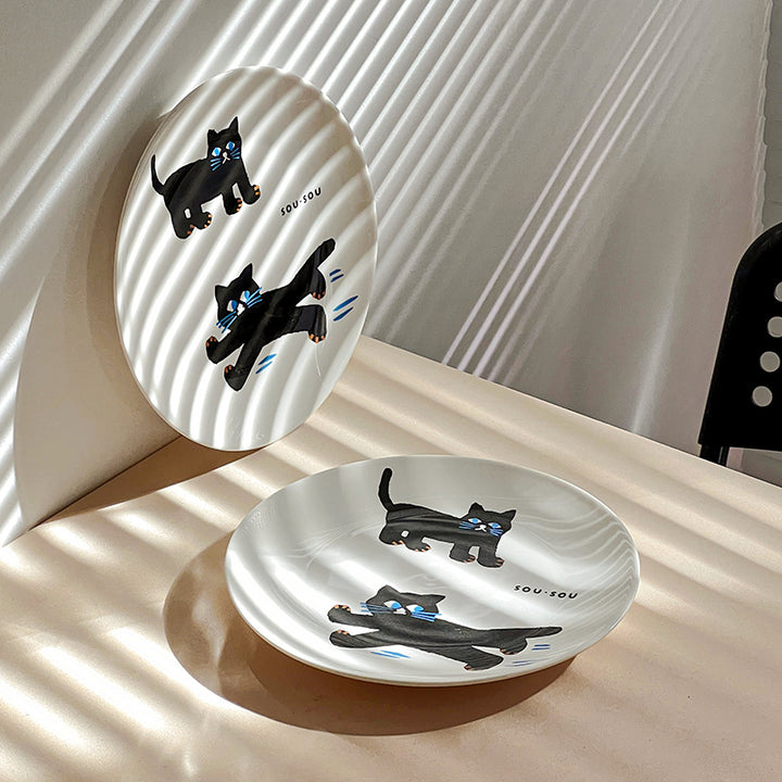 Ceramic plate with playful cat motif and matte-gloss glaze